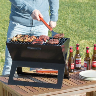 Klappbarer tragbarer Grill für die Verwendung mit Holzkohle FoldyQ